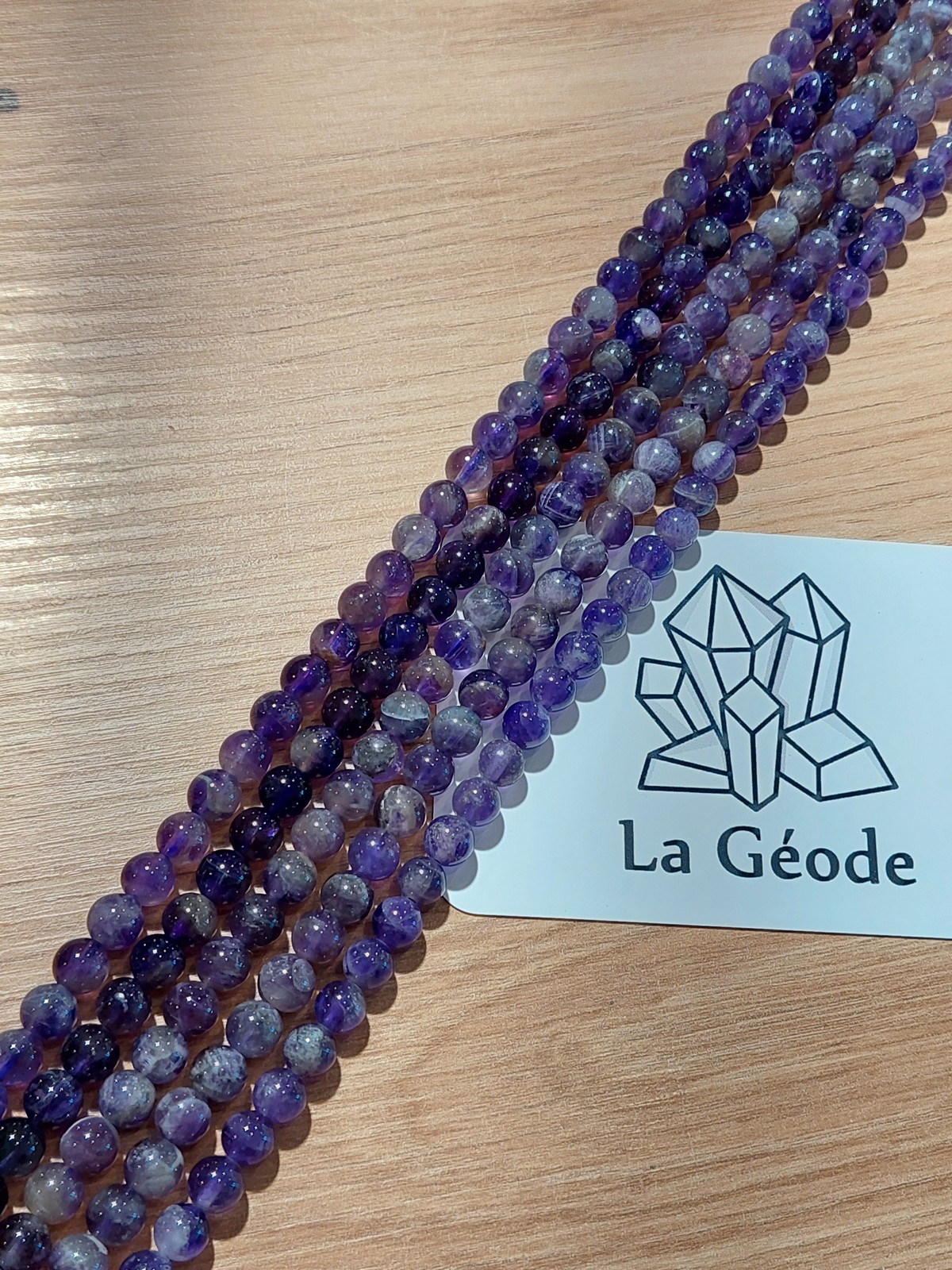 Fil de perles rondes en Améthyste 6 mm | Boutique suisse de pierres du monde & lithothérapie