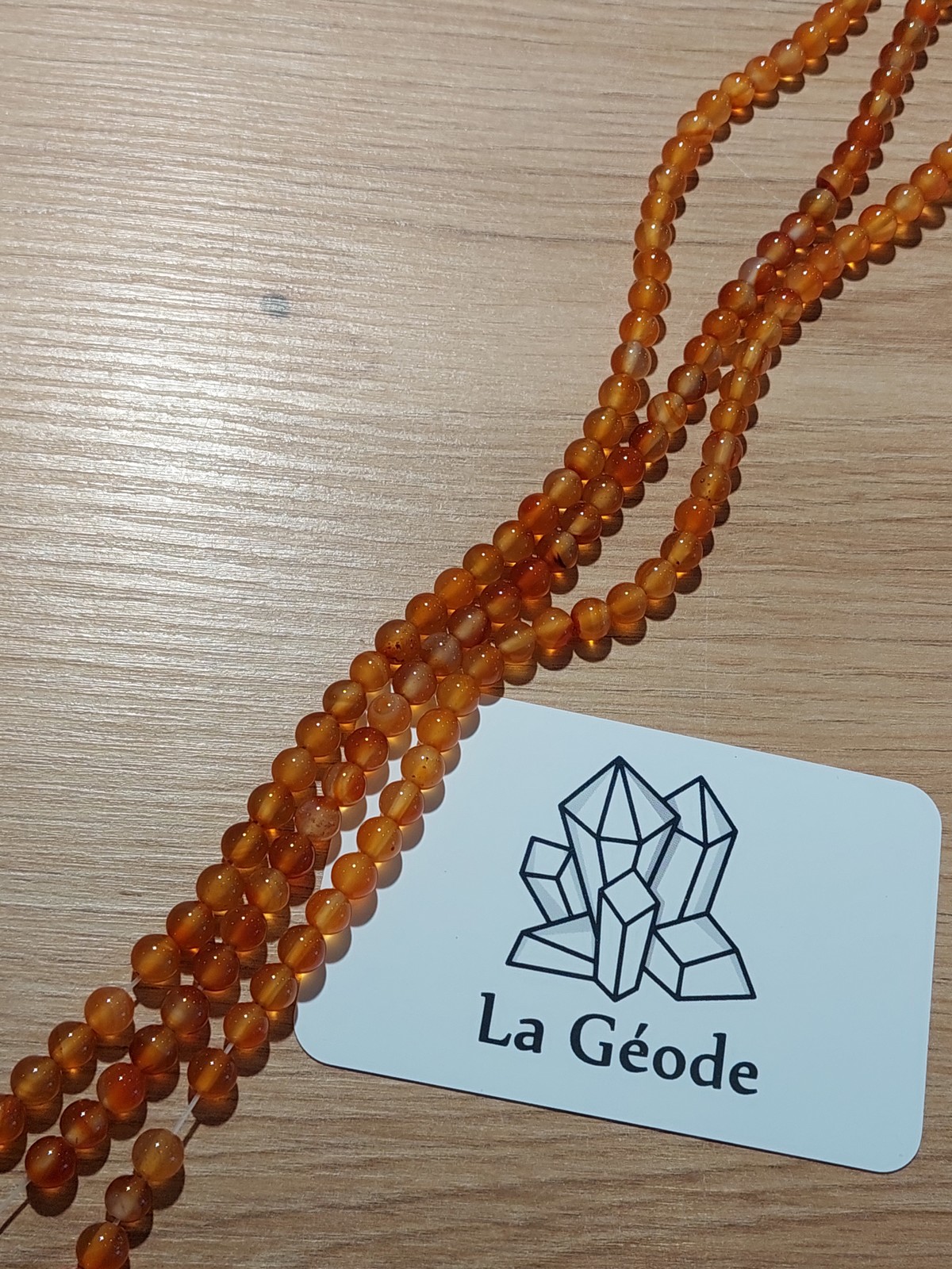 Fil de perles rondes en Cornaline 6 mm | Boutique suisse de pierres du monde & lithothérapie