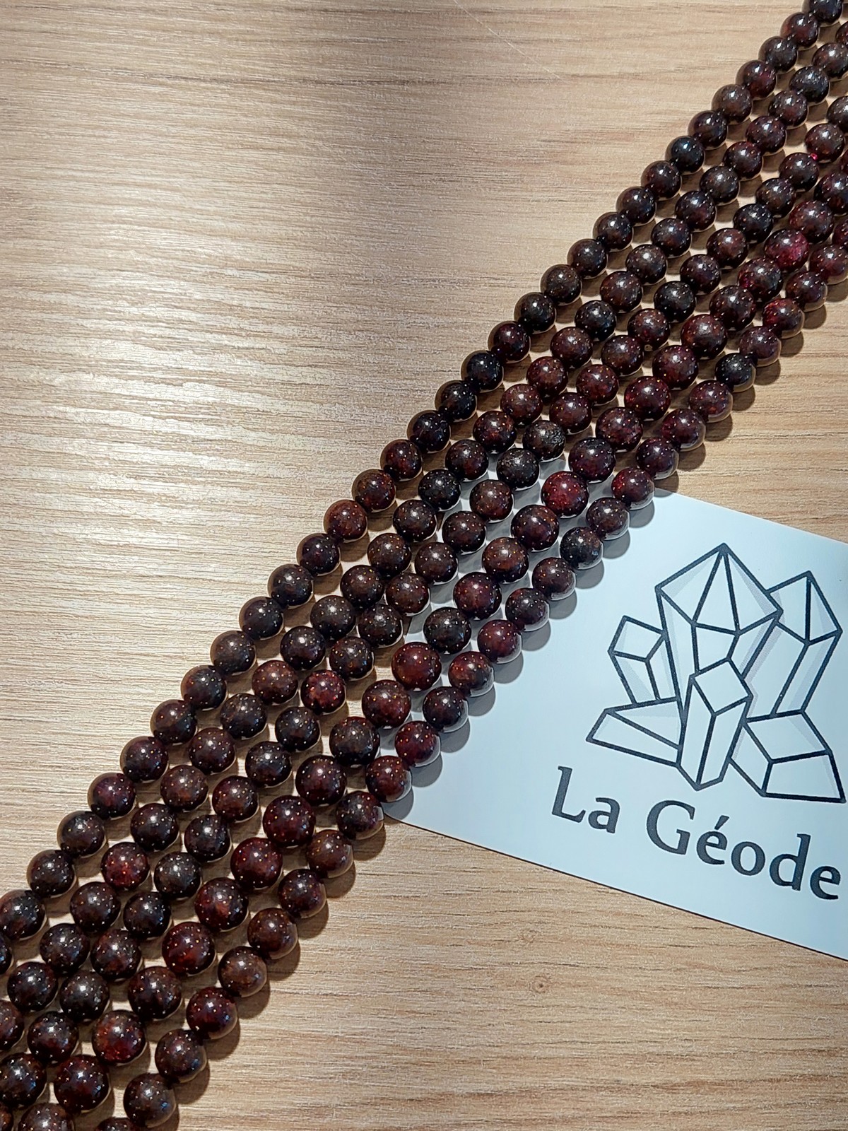 Fil de perles rondes en Grenat 6 mm | Boutique suisse de pierres du monde & lithothérapie