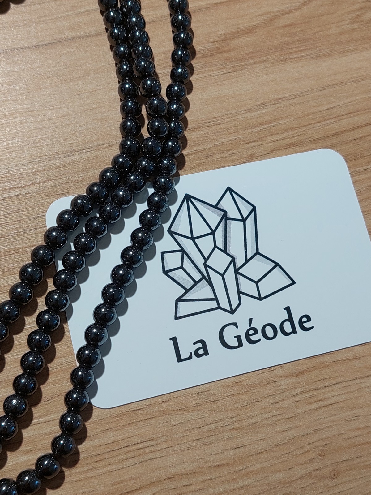 Fil de perles rondes en Hématite 6 mm | Boutique suisse de pierres du monde & lithothérapie