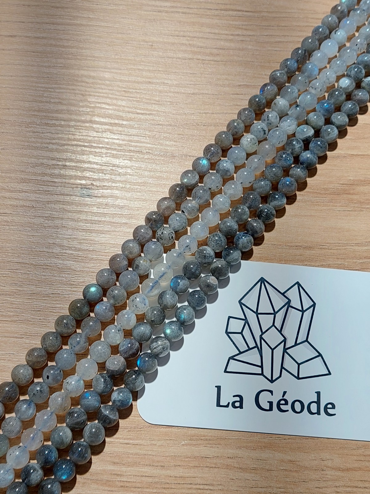 Fil de perles rondes en Labradorite 6 mm | Boutique suisse de pierres du monde & lithothérapie