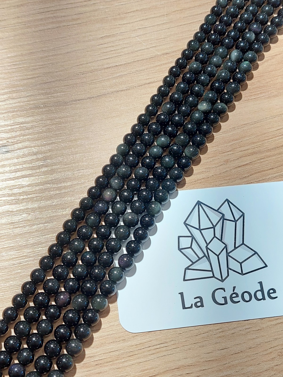 Fil de perles rondes en Obsidienne oeil céleste 6 mm