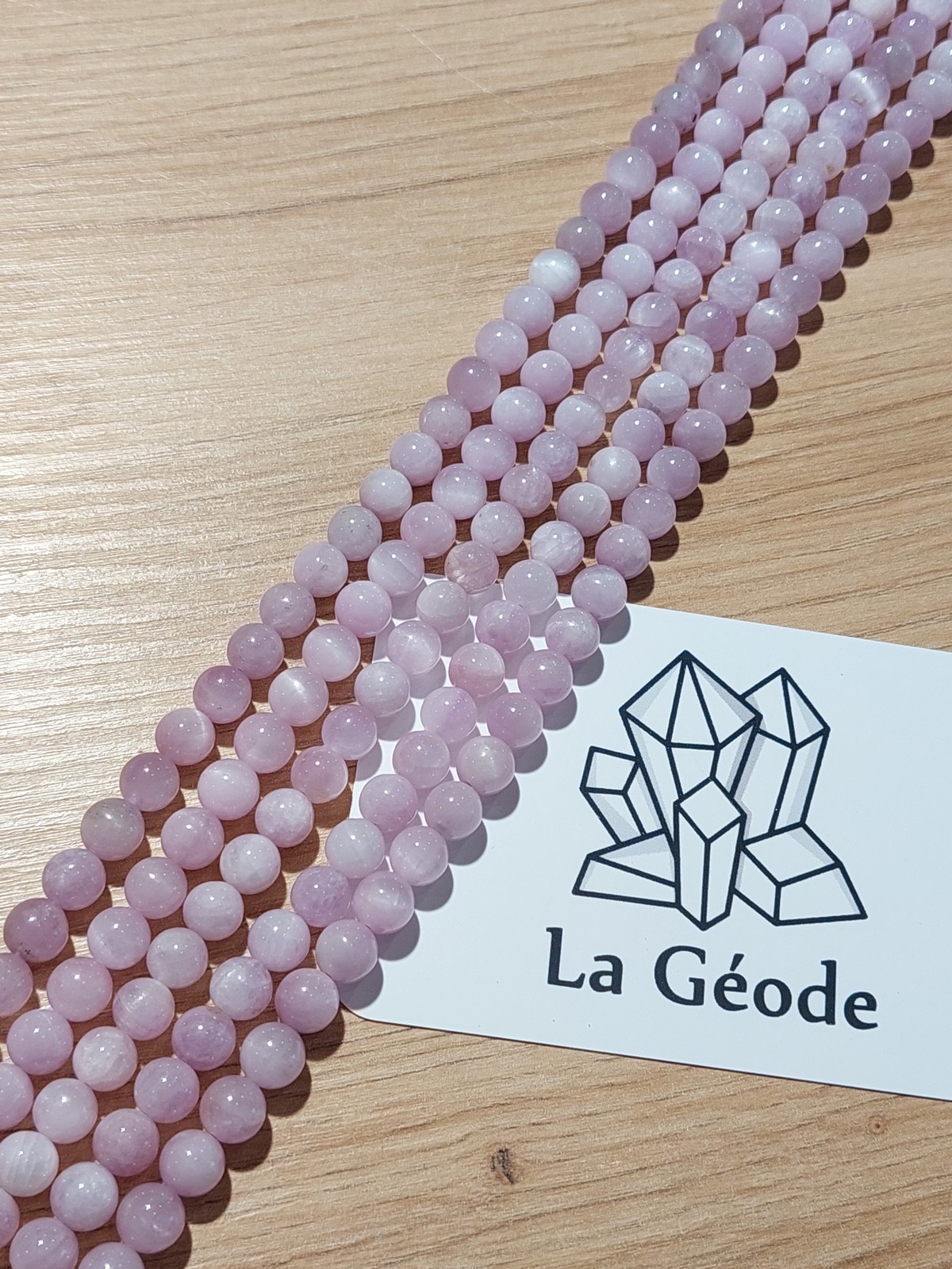 Fil de perles rondes en Kunzite 6 mm| Boutique suisse de pierres du monde & lithothérapie