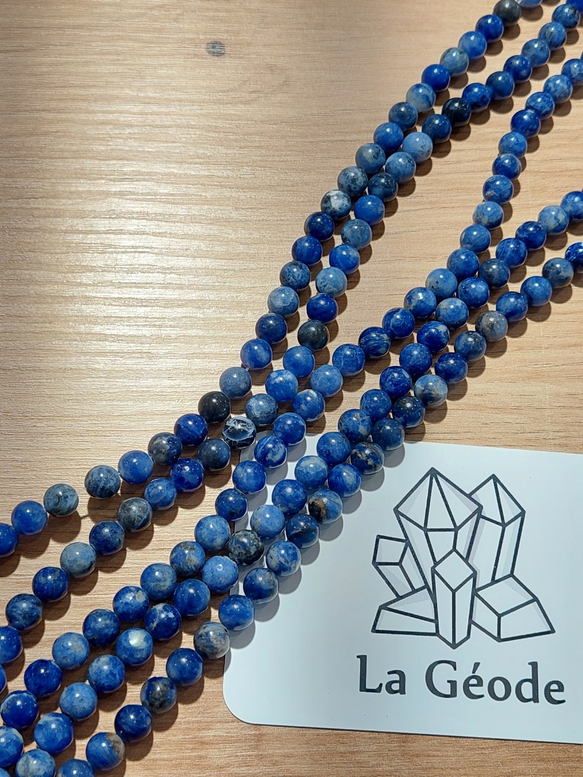 Fil de perles rondes en Sodalite 6 mm | Boutique suisse de pierres du monde & lithothérapie