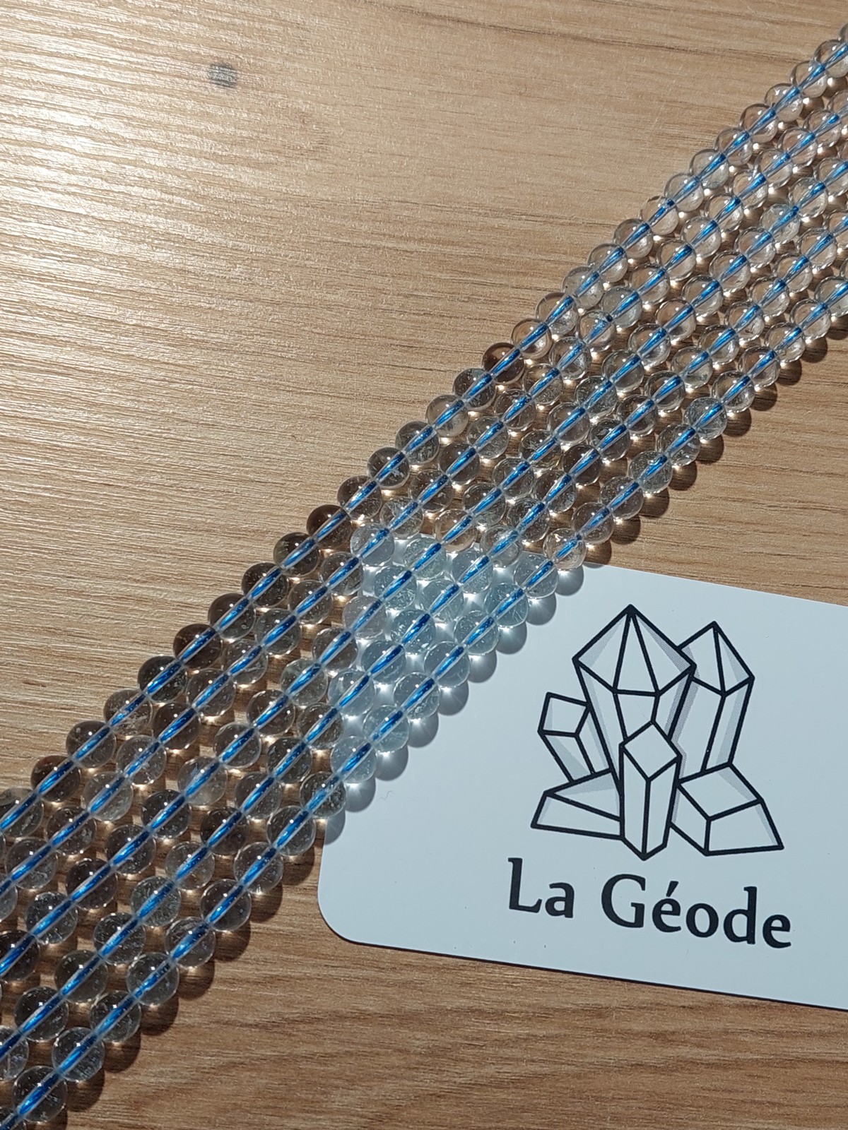 Fil de perles rondes en Topaz bleue 6 mm| Boutique suisse de pierres du monde & lithothérapie