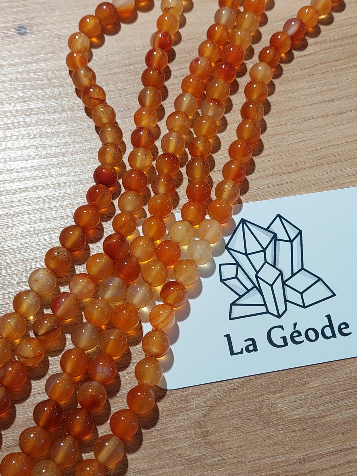 Fil de perles rondes en Cornaline 8 mm | Boutique suisse de pierres du monde & lithothérapie