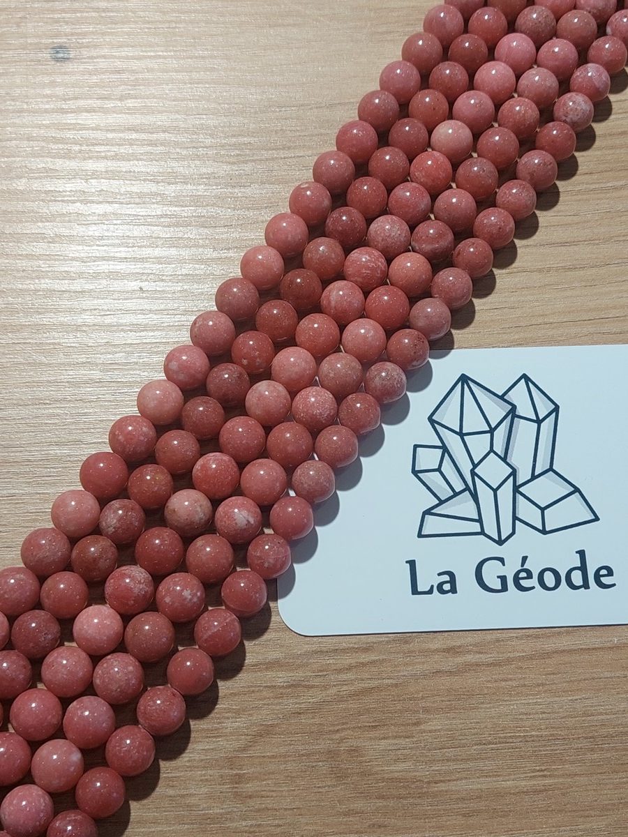Fil de perles rondes en Thulite 8 mm | Boutique suisse de pierres du monde & lithothérapie